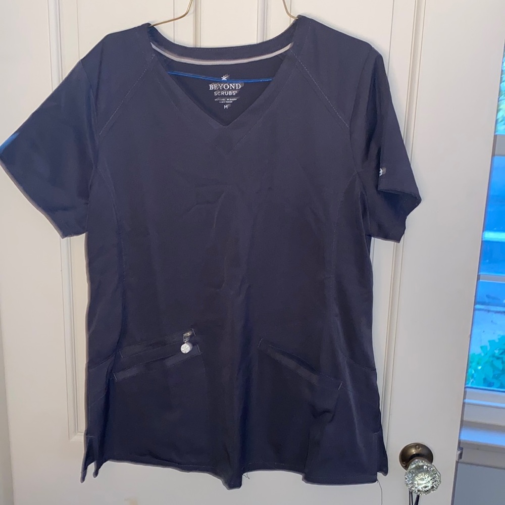 A dark grey, comfy, scrub top